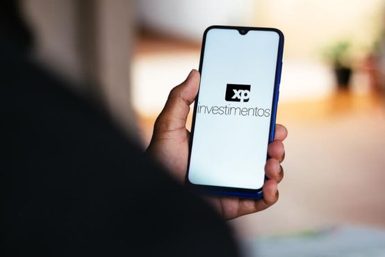 XP vende crescimento, mas mercado quer lucro, diz JP Morgan